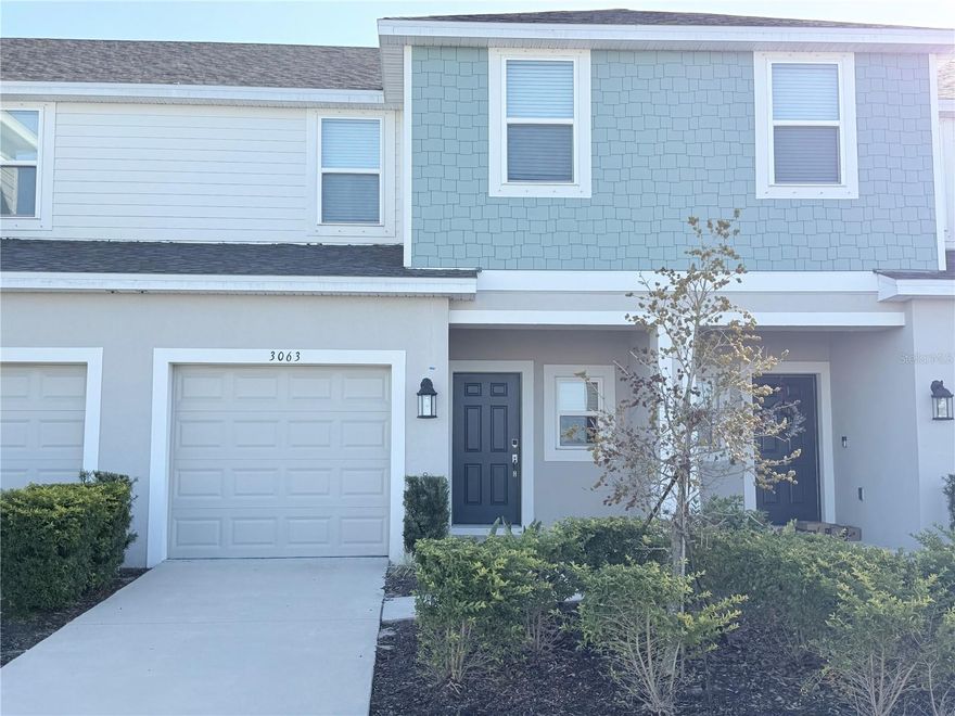 Step into this brand-new, never-lived-in townhome in Azario, at the heart of Lakewood Ranch—1,373 sq ft of fresh, modern living. It features three bedrooms, two-and-a-half baths, and a one-car garage, with an open layout that makes the kitchen, dining, and living areas feel bright and connected. The large kitchen island is perfect for cooking, hosting, or just hanging out.

On the first floor, you also have a convenient half bath and a spacious outdoor patio for relaxing or entertaining. Upstairs, there are two guest bedrooms with a full bath, plus a generous primary suite with a walk-in closet and a double-vanity bathroom. The laundry is right upstairs too—super convenient.

Storage definitely isn’t an issue here, with a big pantry, linen closet, under-stair storage, and closets in all three bedrooms.

And the location is a huge bonus—you’re literally right next to the brand-new Publix and the new elementary school opening next year. Everything you need is just moments away.