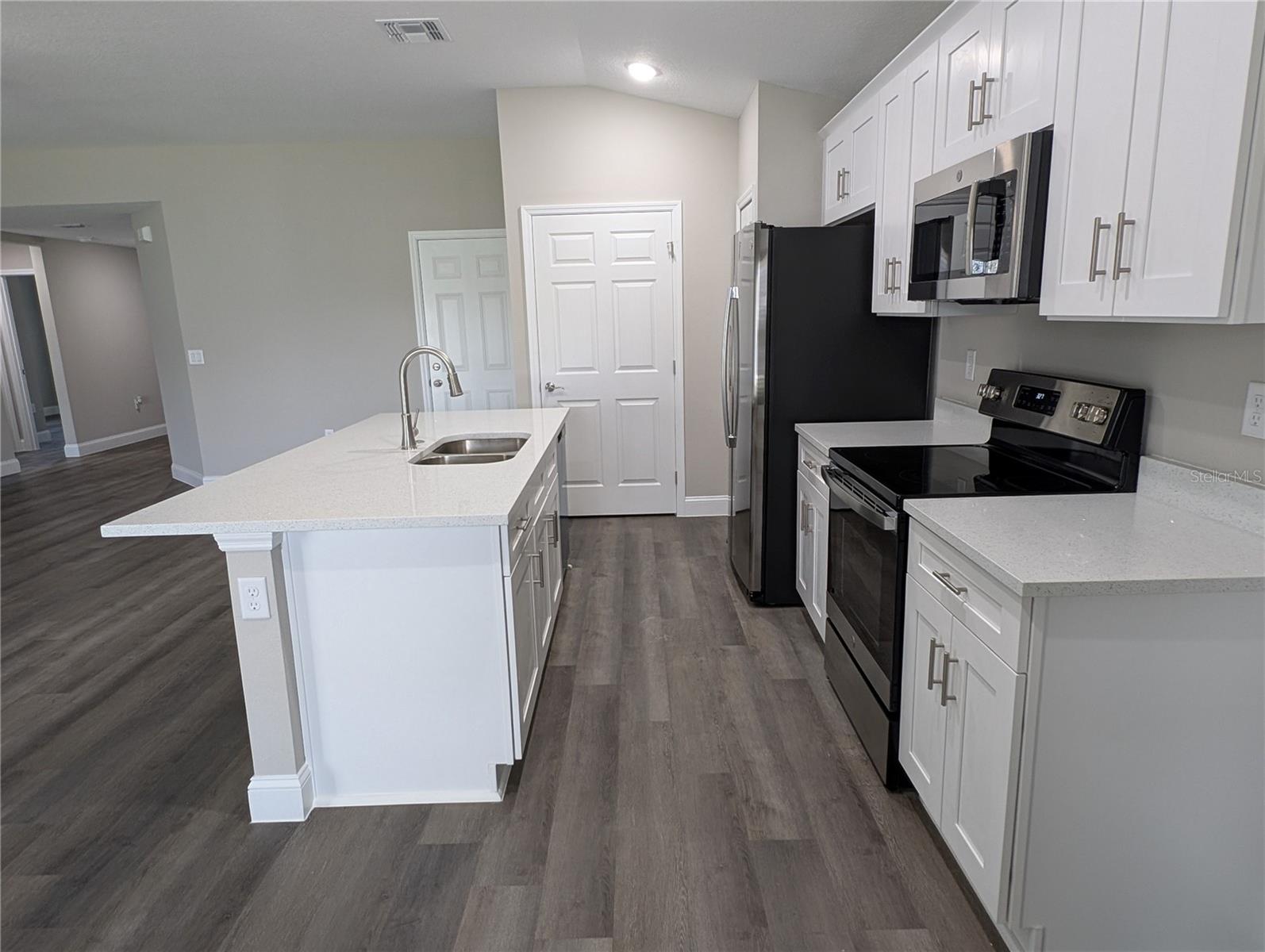 This beautiful and brand new 3 bedroom home is located in The Groves at Lake Ella, a new, charming, pet-friendly rental rental home community in Lady Lake, Florida. The home is designed with beautiful features and finishes throughout such as quartz counters, soft-close shaker cabinets, luxury vinyl flooring throughout, energy-efficient stainless steel appliances, garbage disposal, and washer/dryer included. The open concept floor plan offers ample space for cooking, dining, and entertaining. The primary bathroom offers dual-sinks with plenty of under-sink storage as well as a linen closet and private toilet.
Explore all five spacious three and four-bedroom floor plans to find your dream home. Your home should be your sanctuary, so we designed our homes with you in mind. Savor the modern comforts of new home construction while relishing the hassle-free & maintenance-free lifestyle of renting.
The Groves at Lake Ella is centrally located to Lady Lake, The Villages, Wildwood, and Leesburg all within a 10-15 minutes drive while still maintaining a quiet, cozy atmosphere away from the hustle and bustle. You are sure to fall in love - come tour today!