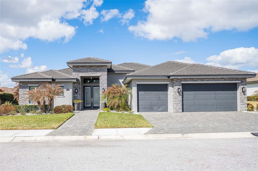 Photo of 1957 Grasslands Boulevard, Lakeland, FL 33803 (MLS # L4958536)