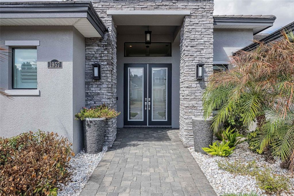 Photo of 1957 Grasslands Boulevard, Lakeland, FL 33803 (MLS # L4958536)