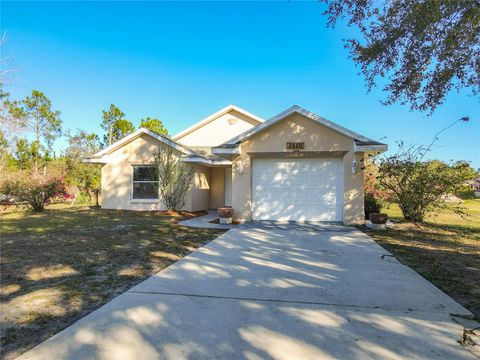 Photo of 2850 Poinciana Drive, Indian Lake Estates, FL 33855 (MLS # O6375692)