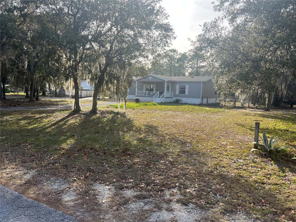 Photo of 2042 S Sunwood Point, Homosassa, FL 34448 (MLS # TB8533631)