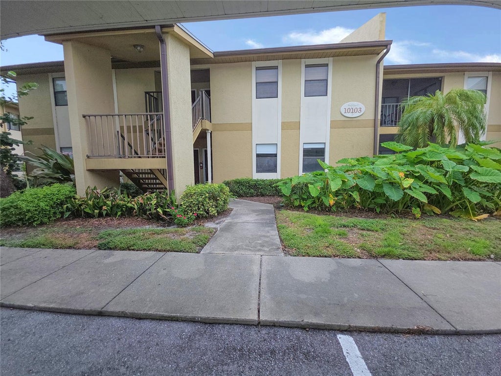 Photo of 10103 Sailwinds Boulevard N #102, Largo, FL 33773 (MLS # TB8561328)