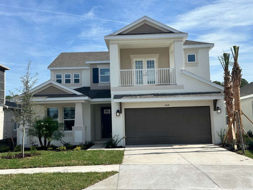 Photo of 2048 Riparian Lane, Wesley Chapel, FL 33543 (MLS # J971897)