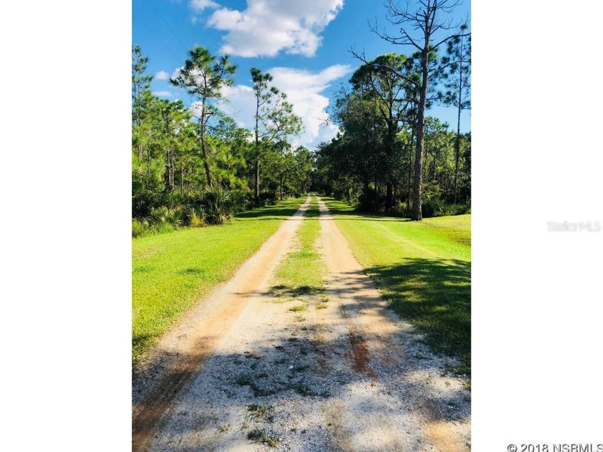 TAKE ME HOME .. ON A BEAUTIFUL COUNTRY ROAD ... THIS CHARMING 2 BEDROOM  2 BATH, WAS CUSTOM BUILT BY OGG BROTHERS IN 2005.A COUNTRY COTTAGE WITH FRONT PORCH AND METAL ROOF WILL AMAZE YOU WITH ITS WELL BUILT OPEN FLOOR PLAN AND OVERSIZED LOT. A NEW AC WAS INSTALLED IN 2014. CUSTOM CABINETRY AND ISLAND IN THE KITCHEN OVERLOOKS FAMILY ROOM AND DINING ROOM. ALL ROOM DIMENSIONS ARE APPROX. AND SHOULD BE VERIFIED.