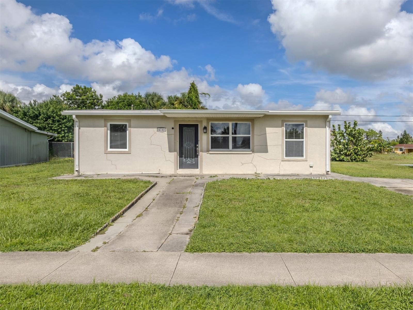 Clean & move-in ready! Remodeled in 2013 with new roof, windows, central AC, water heater, wood kitchen cabinets, stainless appliances & tile throughout. Main bath features frameless glass shower & modern finishes. Half bath + laundry room accessible from back. Enjoy front & back patios in a quiet neighborhood with city water & sewer.
Located in fast-growing North Port—close to Warm Mineral Springs, Myakka Forest, shopping, beaches, Braves spring training & more. Easy access to Sarasota, Punta Gorda & Fort Myers airports.