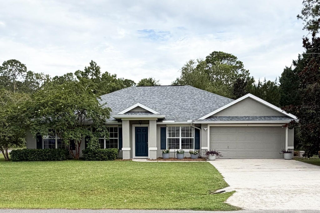 Photo of 1 Sleeping Beauty Place, Palm Coast, FL 32164 (MLS # FC320472)