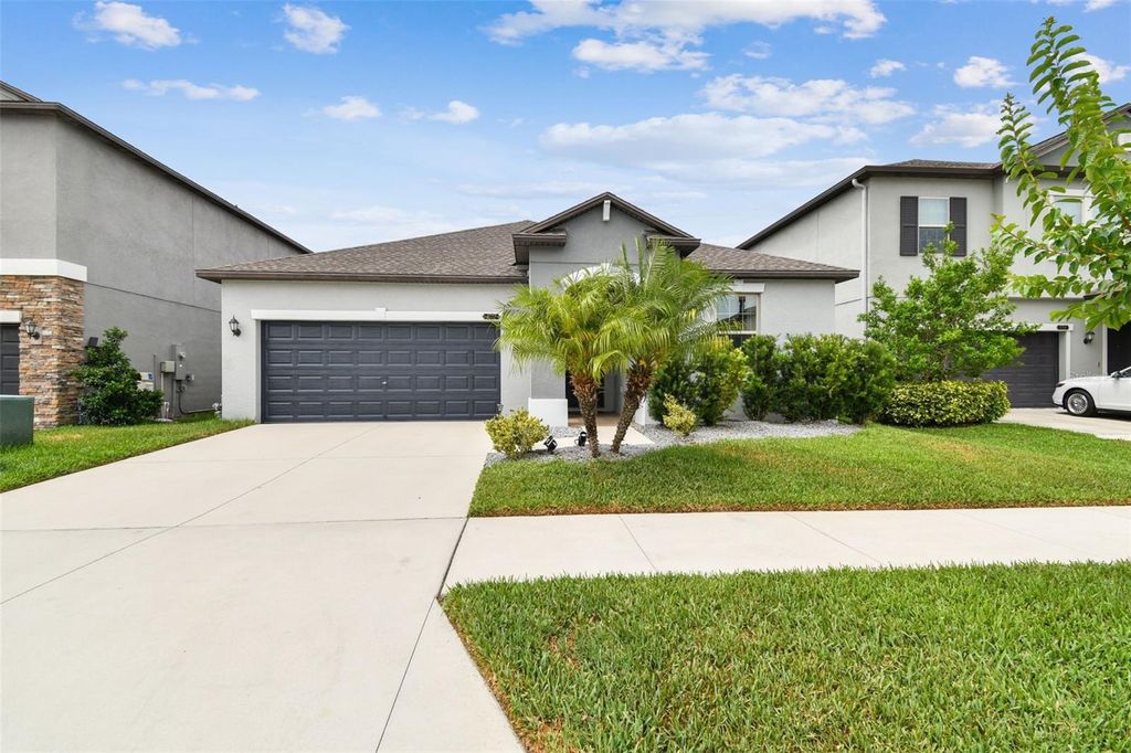 Photo of 8772 Flourish Drive, Land O Lakes, FL 34637 (MLS # TB8383116)