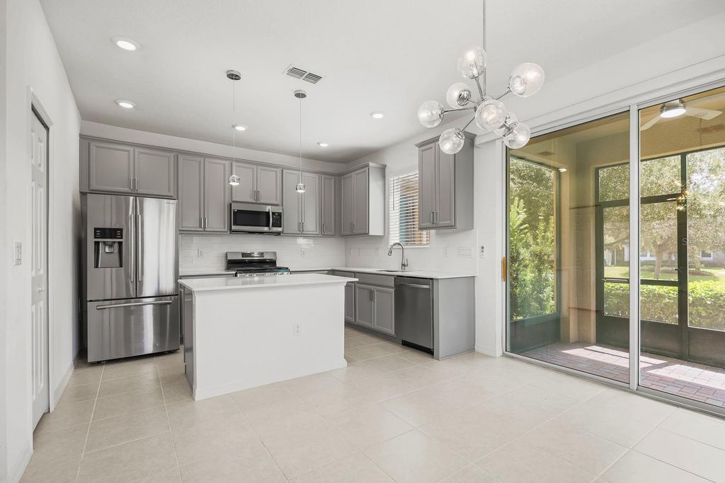 Photo of 5786 Spotted Harrier Way, Lithia, FL 33547 (MLS # TB8424562)