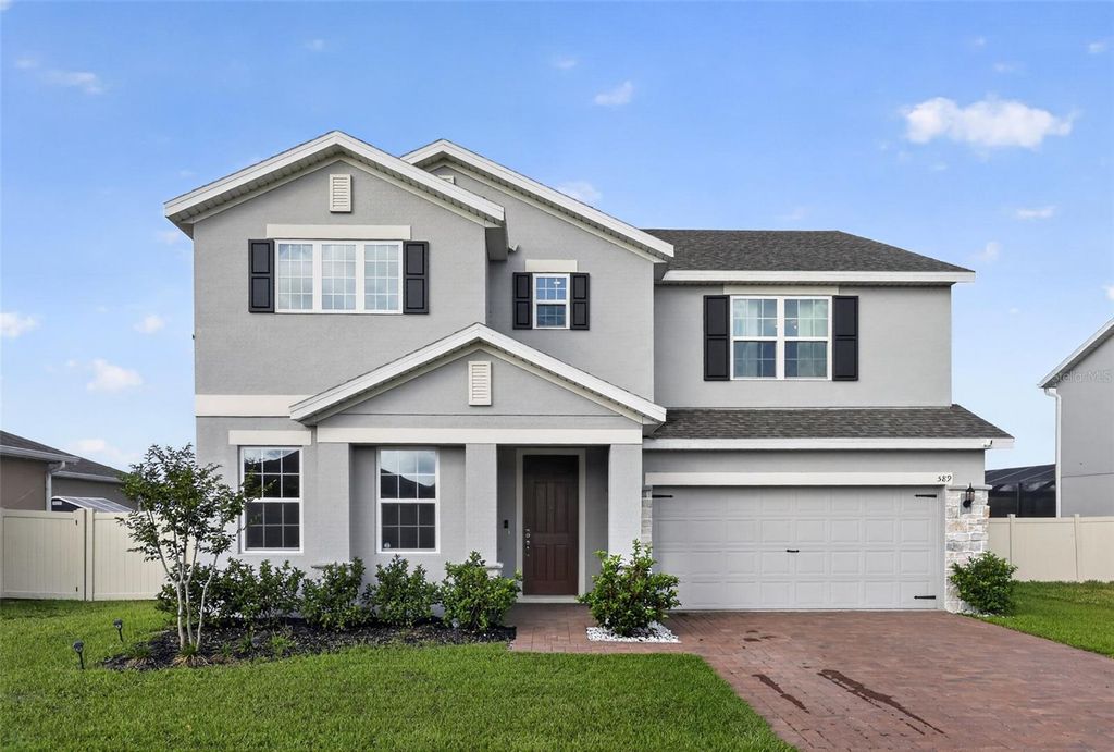 Photo of 589 Jupiter Beach Road, Groveland, FL 34736 (MLS # O6412117)