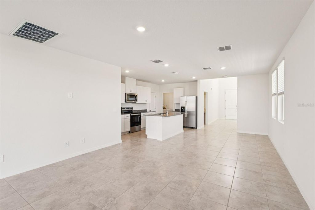 Photo of 879 Sunshower Drive, Haines City, FL 33844 (MLS # O6348077)