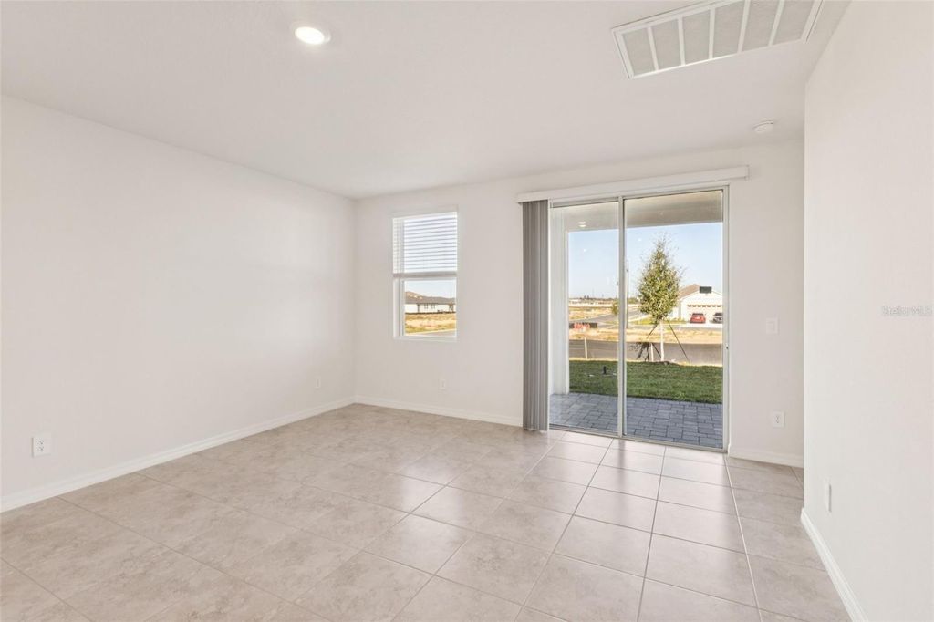 Photo of 879 Sunshower Drive, Haines City, FL 33844 (MLS # O6348077)