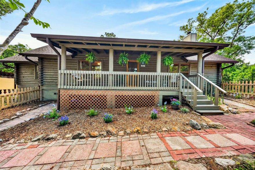 Escape the ordinary in this authentic log home sanctuary that offers the perfect blend of rustic tranquility and modern convenience. Nestled on nearly half an acre of private land, this property provides the rare opportunity to own a peaceful retreat while remaining just minutes from major highways, premier shopping, and local dining. First-time buyers will appreciate the move-in-ready appeal and expansive yard, while those looking to upgrade will find the spacious floor plan and unique architectural details they have been searching for. A charming covered front porch welcomes you into an impressive interior featuring soaring ceilings, a magnificent stone fireplace, and rich wood flooring. The vast open-concept living and dining area serves as the heart of the home, flowing seamlessly into a chef-friendly kitchen equipped with stainless steel appliances, a generous pantry, and a large breakfast bar perfect for morning coffee. Each secondary bedroom offers surprising scale and abundant natural light, while the primary suite provides a secluded getaway complete with a walk-in closet and private ensuite bath. The true hidden gem is the oversized 24x24 walk-out basement, featuring its own dedicated mini-split climate control system to create the ultimate home office, media room, or guest quarters. Located in a prime position near Gemini Springs and the DeBary SunRail station, this home offers a lifestyle of both adventure and accessibility.