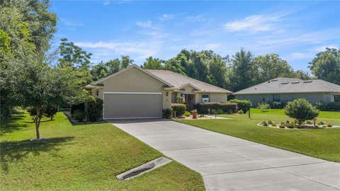 Photo of 3125 N Canterbury Lake Drive, Hernando, FL 34442 (MLS # TB8523450)