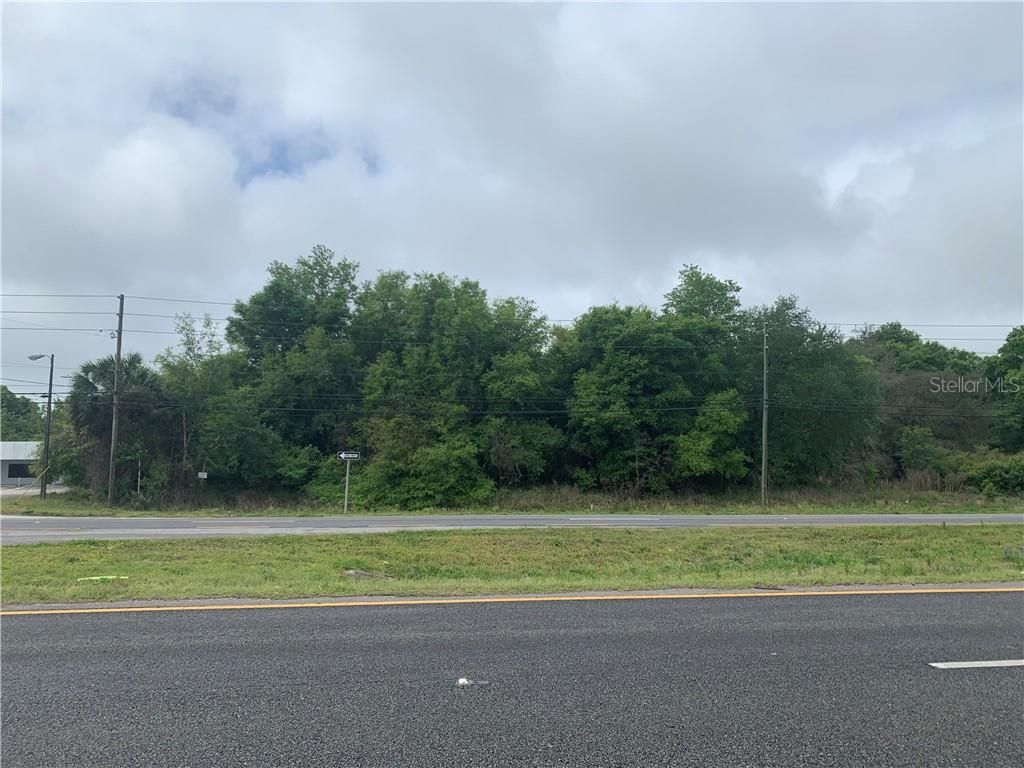 Photo of 0 N Woodland Boulevard, Deland, FL 32720 (MLS # V4918224)