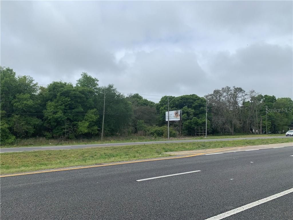 Photo of 0 N Woodland Boulevard, Deland, FL 32720 (MLS # V4918224)
