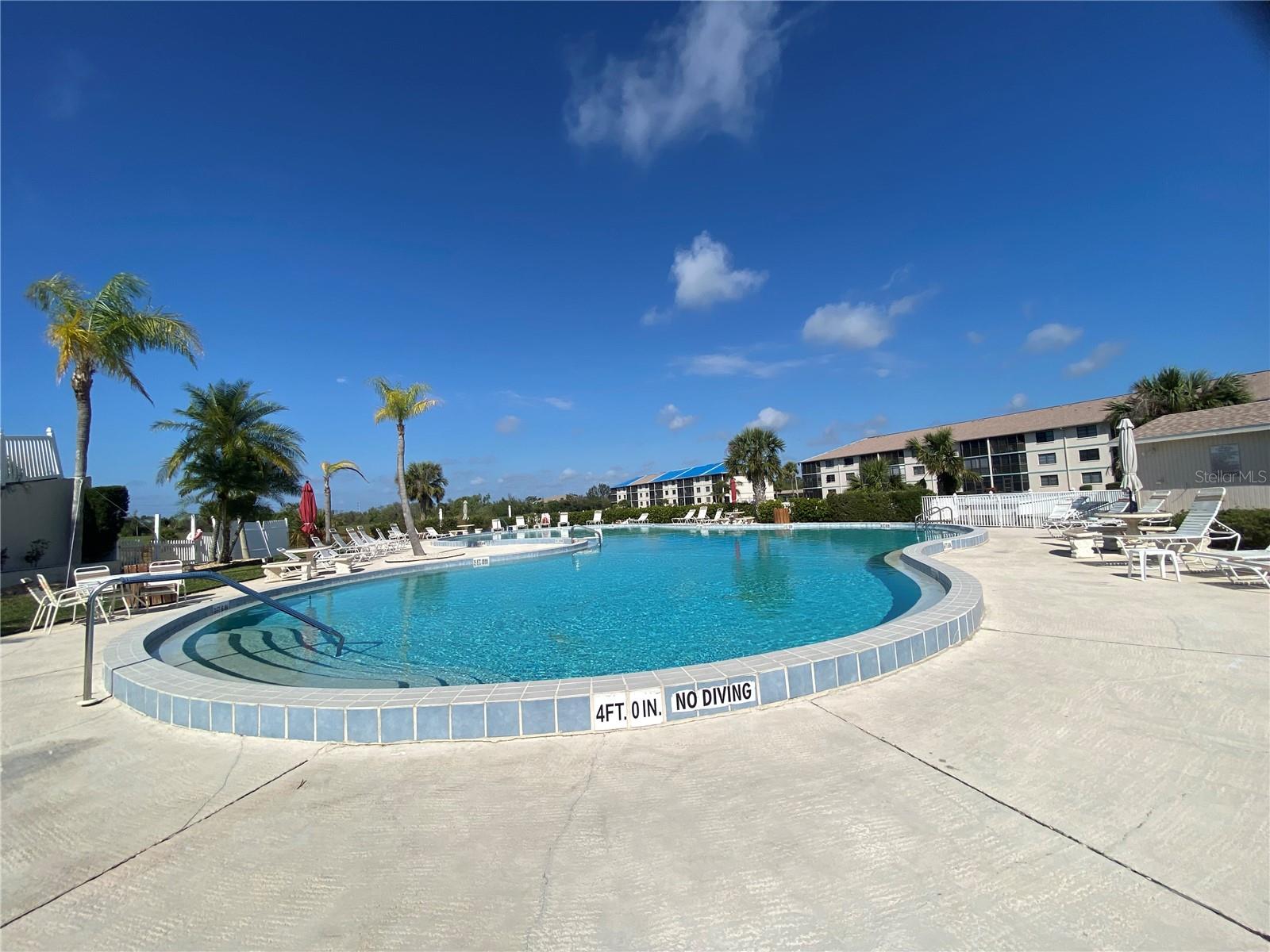Enjoy peaceful living in this bright and spacious 2-bedroom, 1-bath condo with stunning lake views and wide-open grassy areas right outside your door. Inside, you'll find a large living area, modern appliances, and plenty of natural light throughout. This condo is move-in ready and offers the comfort and convenience you need. The unit features updated vinyl plank flooring, a well-appointed kitchen, and a screened lanai overlooking the water perfect for relaxing or enjoying morning coffee. A dedicated carport space is included for your vehicle. Located in a well-maintained community that offers a heated swimming pool, tennis courts, bocce and pickleball, plus a friendly neighborhood vibe. water, sewer and garbage included. Not in a flood zone and just minutes from shopping, I-75, Downtown Punta Gorda, and Fishermans Village. Schedule your private or virtual tour today this one won't last long!