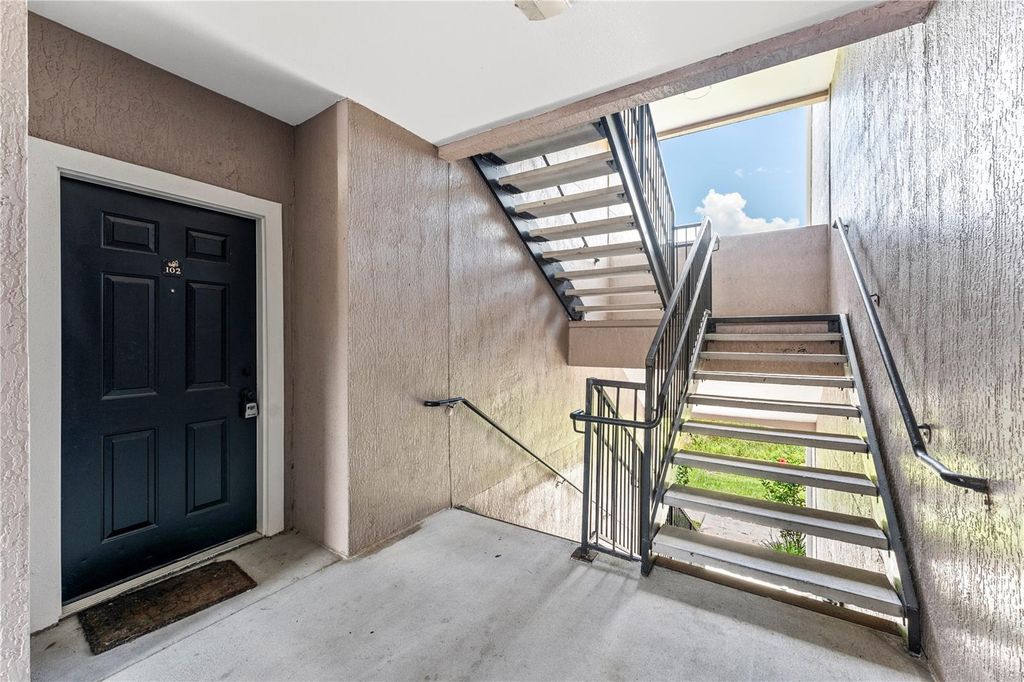 Photo of 3384 Corona Village Way #102, Orlando, FL 32835 (MLS # S5143543)