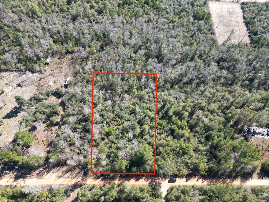 Don’t miss this beautiful 1.28-acre wooded residential lot in Compass Lake in the Hills, just outside Marianna, Florida. Tucked away in a peaceful, natural setting and located just minutes from a paved road, this property offers the perfect opportunity to build your dream home or invest in one of Northwest Florida’s fastest-growing areas. Mobile and manufactured homes are permitted with approval, giving you added flexibility when planning your future home. Located in the heart of Jackson County, Compass Lake in the Hills is a 10,000-acre, equestrian-friendly planned community known for its scenic beauty and outdoor lifestyle. Property owners enjoy access to two spring-fed lakes — Compass Lake and McCormick Lake — ideal for boating, fishing, kayaking, skiing, and swimming. Compass Lake is an all-sports lake with average depths of 35–40 feet and springs reaching approximately 70 feet, while McCormick Lake offers a quieter setting with beach areas and electric-motor-only boating. Community amenities include two clubhouses, an inground swimming pool, tennis courts, docks, RV parking, cabin and boat rentals, picnic areas, disc golf, waterfront dining, and more. An optional HOA membership ($135/year) provides access to the pool, docks, and additional amenities. According to current flood maps, the property is not located in a flood zone. Ideally situated near Highway 231, this location places you approximately 45 minutes from Panama City and about an hour from the beautiful sandy beaches of the Gulf Coast. You’ll also be close to Three Rivers State Park, Florida Caverns State Park, Falling Waters State Park, Jackson Blue Springs, Econfina Creek, Merritt’s Mill Pond, the Chipola River, and Holmes Creek — all popular destinations for kayaking, cave diving, hiking, horseback riding, and exploring Florida’s natural beauty. Positioned nearly equal distance between Panama City Beach and Dothan, Alabama, this property offers the perfect balance of privacy and convenience. Whether you're ready to build now or looking for a smart investment in Florida’s growing Panhandle, this lot is an opportunity you don’t want to miss.