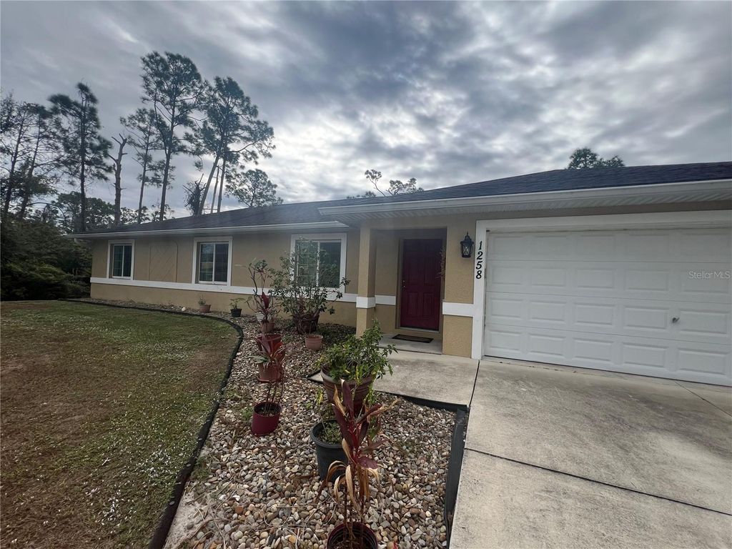 Photo of 1258 Amnesty Drive, North Port, FL 34288 (MLS # C7518853)