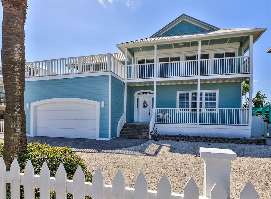 Direct ocean front home on a section of the no-drive on beach area. This home has been remodeled. The house features metal roof, hardie board siding, paver drive, bamboo and tile flooring. Open floor plan and decks off of the main living areas. ;Water: City