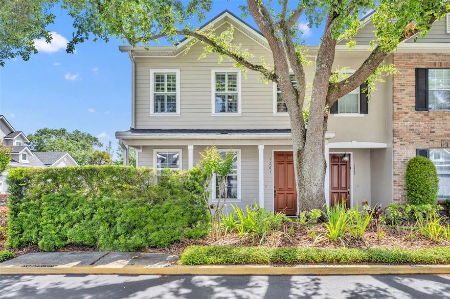 Tucked in the heart of Harper Place, this 3-bedroom, 2.5 bath end unit townhome 1,660 sq ft of light-filled, low maintenance living in a thriving Winter Park location. The main level features a spacious living and dining room combo plus a separate family room and kitchen-perfect for entertaining. The kitchen includes a gas cooktop and range, granite counters, island, breakfast nook, and built-in cabinetry and desk. French doors open to a private side patio ideal for relaxing, pot gardening or grilling. The interior laundry off the kitchen leads out to the functional 2-car garage. Upstairs, the primary bedroom has a walk-in closet. The primary bath has a walk-in shower. Two secondary bedrooms offer flex space and share a bath with a tub shower. Wood floors downstairs and carpet upstairs. Recent updates include roof and gutters in 2022, exterior paint in 2023 and water heater in 2024.  Community improvements continue with road resealing in the Spring of 2026, enhancing a well-kept neighborhood. 1261 Indiana is a great fit for a buyer seeking comfort, urban convenience, and a simplified lifestyle. Close to 1-4, shops, restaurants, hospital, and museums.