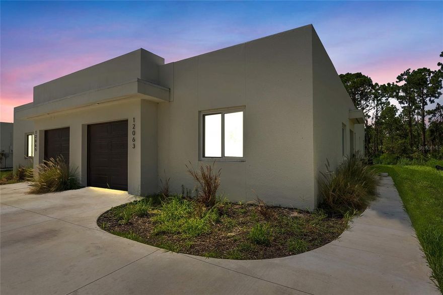 BUILT IN 2021 - MODERN AND UNIC DESIGN - FLOOD ZONE X ! One side vacant, One side tenanted. 

The contemporary design speaks and make both units extremely desirable. plenty of potential for you there. Two LARGE family friendly units. Property located in a very QUIET street. Extremely well located, 10 minutes from the beach/Manasota Key and minutes to all shops. This is an excellent investment property. Current tenant pay $1,650 a month which is under market rent for those units in this area (Market rent is $1,900 to $2,000 a month per unit). This duplex features 3 bedrooms, 2 baths and 1 car garage on each side. Features include an open floor plan, large kitchen with stainless steel appliances and Granite tops, breakfast bar, tile floors throughout entire unit, great room/dining combo area, great rear entertaining space, Walk-in master closets, laundry room in unit (washer/dryer not included), impact windows and back patio from Masterbedroom. Large Lot with Matures trees in the backyard. NO HOA and NO CDD !