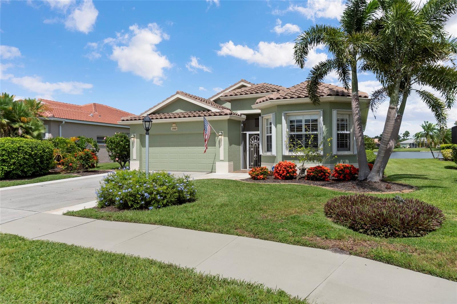 Welcome to Bobcat Trail! This beautifully maintained 3-bedroom, 2-bath home offers over 2,100 sq. ft. of living space with serene water views and a bright, open floor plan designed for comfort and style.
The spacious primary suite is a true retreat, featuring three closets—one a walk-in—plus a fourth in the en-suite, plantation shutters, and direct lanai access. The en-suite bath includes a garden tub, oversized walk-in shower, water closet, and dual sinks. Two additional bedrooms are generously sized for family or guests.
Step inside and you’ll immediately notice the soaring ceilings, elegant double tray ceiling with crown molding, and updated lighting that enhances the home’s modern feel. The home is carpet-free throughout and boasts a new roof (2023), new A/C (2023), new hot water heater (2020), and accordion hurricane shutters for peace of mind.
The updated kitchen features painted wood cabinetry, twin pantry closets, granite countertops, a double-basin sink, and a gas range—perfect for the home chef. Multiple dining options include a formal dining room, breakfast bar, and cozy dinette, making entertaining easy and enjoyable.
Outdoors is where this home truly shines. A huge screened lanai offers the ideal space for relaxing or entertaining while enjoying the calming water view. The property is surrounded by beautiful mature landscaping that enhances curb appeal and privacy. The enlarged driveway, widened by six feet, adds both convenience and style. With no private pool to maintain, you’ll appreciate the low-maintenance lifestyle. The oversized 2-car garage also provides ample storage. And best of all a quick close is possible!
Living in the gated community of Bobcat Trail means you’ll enjoy access to amenities including a heated community pool, fitness center, and clubhouse. Best of all, the low HOA fee of just $218/month covers lawn care, keeping life simple and stress-free. The annual tax bill includes the CDD fee of $2,047.74, and this home is located in Flood Zone X, so no flood insurance is required by lenders.
This home combines thoughtful upgrades, energy efficiency, and a desirable location in one of North Port’s most sought-after communities.