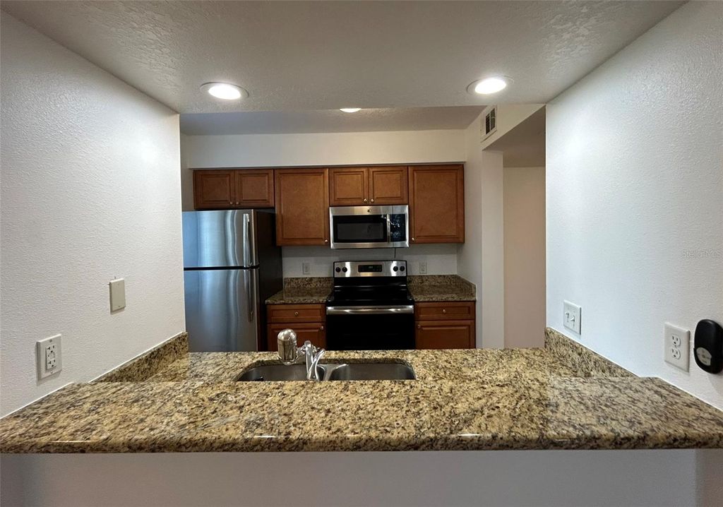 Photo of 220 Riverbend Drive #101, Altamonte Springs, FL 32714 (MLS # O6356979)