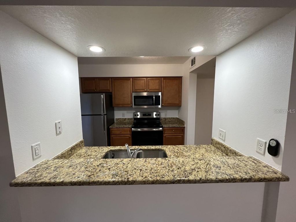 Photo of 220 Riverbend Drive #101, Altamonte Springs, FL 32714 (MLS # O6356979)