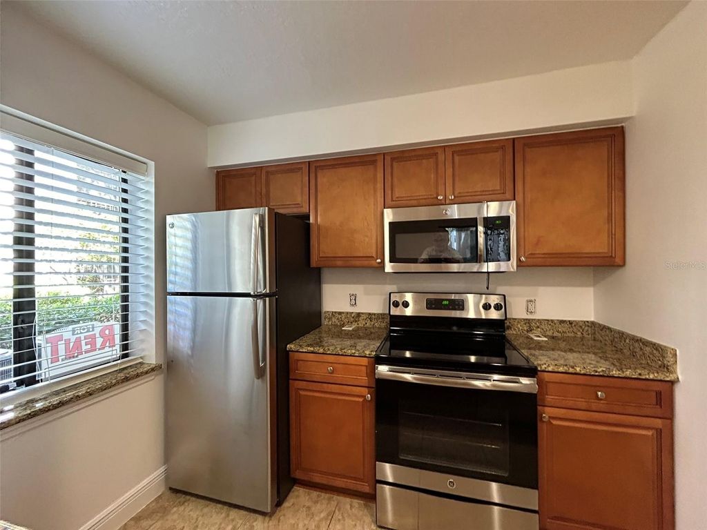 Photo of 220 Riverbend Drive #101, Altamonte Springs, FL 32714 (MLS # O6356979)