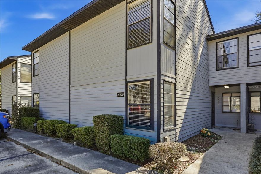 This cozy home is just waiting for you! Low maintenance, with updates and incredibly affordable and less than 2 miles to University of Florida!  This 3-bedroom, 2-bath townhome offers the perfect blend of comfort, updates, and low-maintenance convenience in Gainesville. Step inside this townhome and be greeted by vaulted ceilings and an open concept living area. Along with the community living spaces, downstairs you will find a bedroom and full bathroom and the laundry connections.  The home has NO CARPET, making it easy to maintain. Updates include a recently replaced roof in 2022, and water heater, refrigerator, range hood, bathroom vanities, and light fixtures, and the new wood deck that were all done in 2023. These improvements help reduce immediate update costs and make move-in or tenant turnover easier. Marchwood also offers a low HOA that includes lawn maintenance and access to the community pool, adding convenience and affordability. There are 2 assigned parking spaces and additional visitor parking. With its Gainesville location and practical upgrades, this townhome is an excellent option for buyers seeking a primary residence or investment property with easy upkeep. Only about 3.5 miles to UF Health and the VA hospital medical complexes. Call to schedule your private showing today!