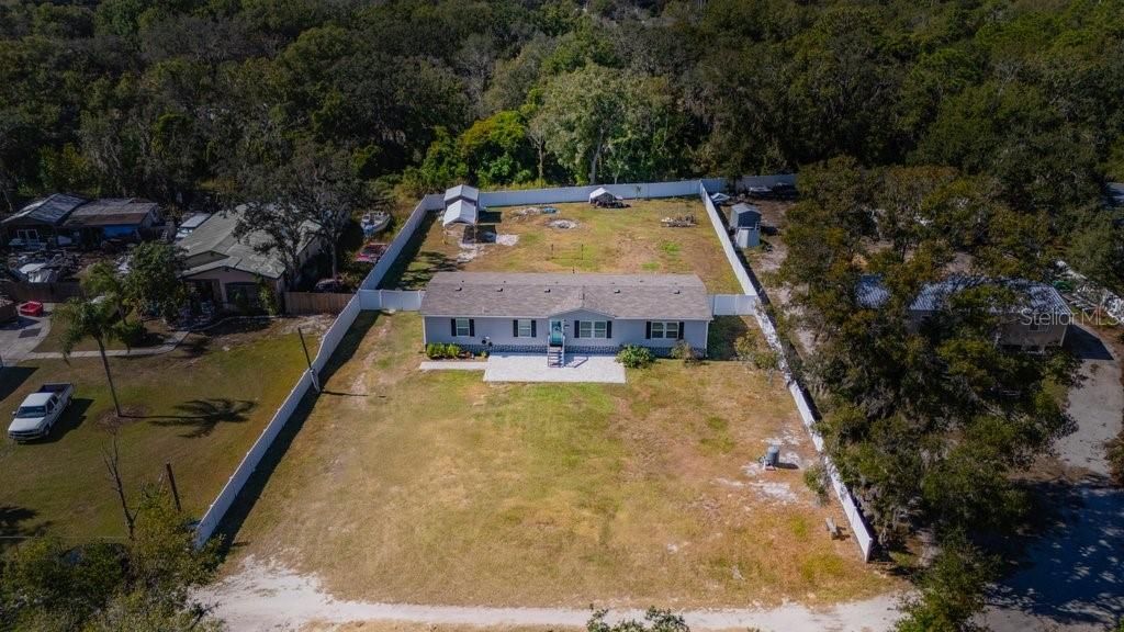 Photo of 9010 Scott Wilson Lane, Odessa, FL 33556 (MLS # TB8448378)