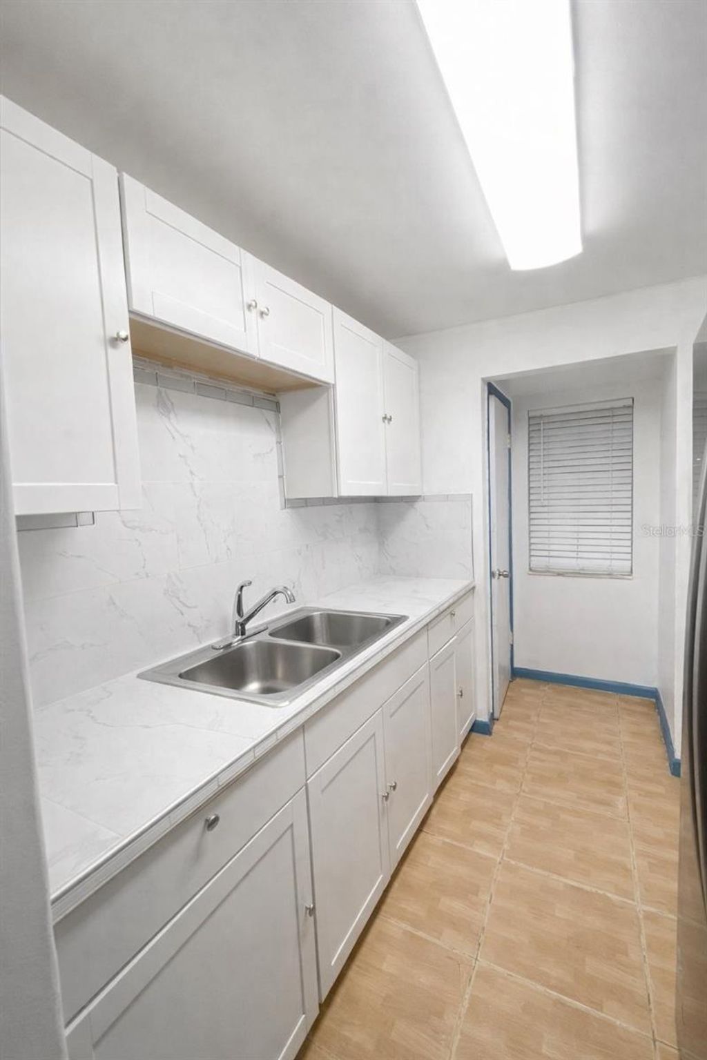 Photo of 2929 W Oak Ridge Road #E6, Orlando, FL 32809 (MLS # O6388031)