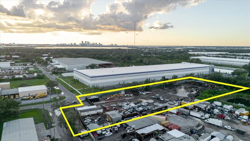 One or more photo(s) has been virtually staged. LOCATION!! LOCATION!! LOCATION!!
Unlock the potential of this exceptional 2.74 acre Industrial Property, currently operating as an Auto Recycling facility. with its unbeatable location in Tampa's top industrial hub, this property offers a rare opportunity for savvy investors and business owners alike. There is a  1,041 sq ft prime office space, featuring 5 private offices, 2 bathrooms, break area and an entry lobby that can serve as a reception area, conference room or showroom. Parking for 40+ semi-trucks, RVs, boats and more. Adjacent to a brand-new 47 acre transportation warehouse. Zoned manufacturing (M) allowing for a wide range of commercial and industrial uses.
Strategically located near I-4, Selmon Expressway, I-75, Hwy 41 and Causeway Blvd. This site provides outstanding connectivity for logistics, distribution and industrial operation. The area's rapid growth and development further amplify the value of this investment, making it an ideal spot for expanding an existing business, launching a new venture or continuing in the recycling/transportation sector.
Opportunities like this are rare. Secure your place in Tampa's booming industrial market today.
Contact me now for details or to schedule a private tour.