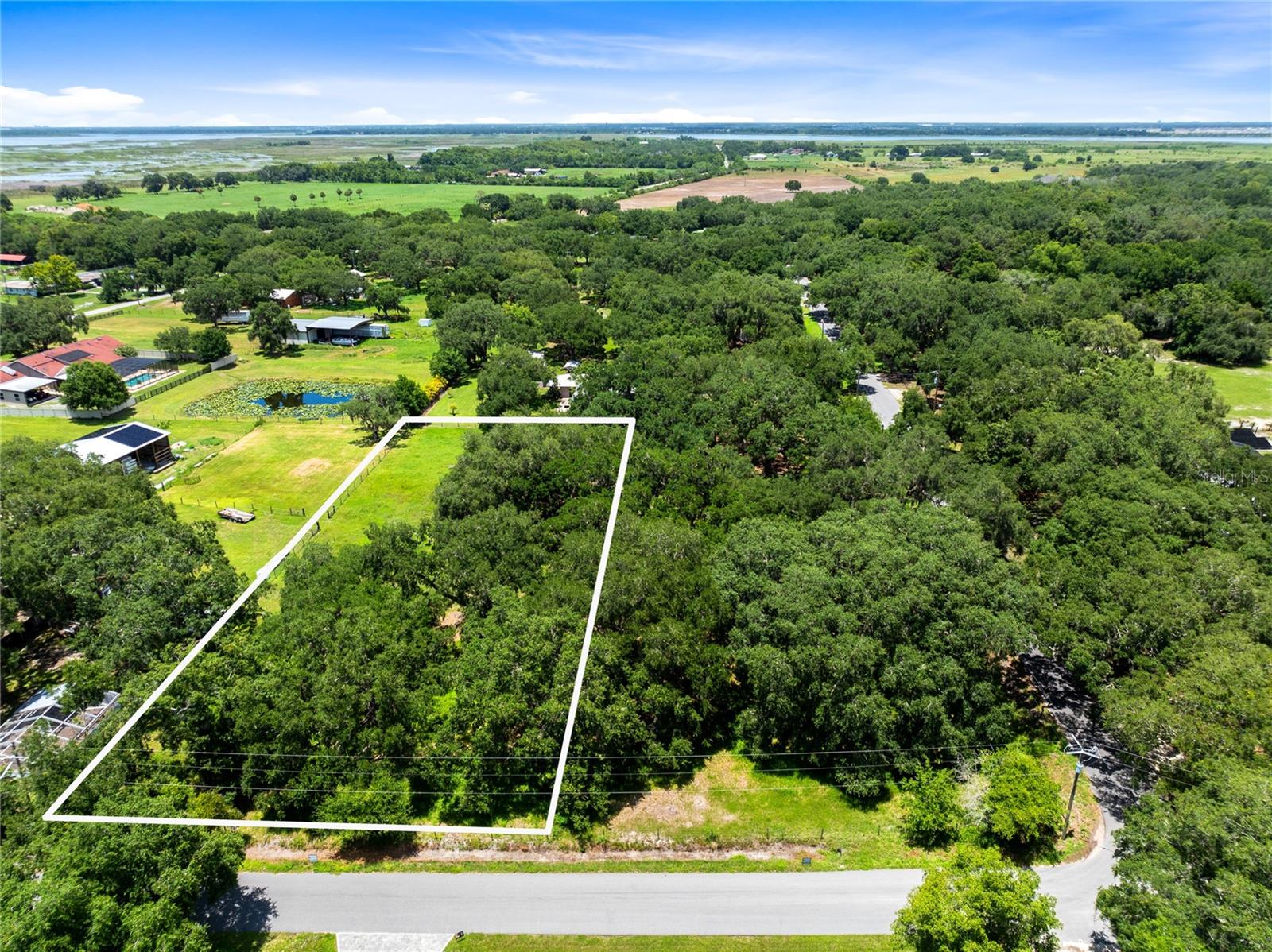 Do you have a DREAM floor plan that you are ready to make a reality? Make that dream a reality on this 1 acre lot that is surrounded by Grandfather Oak trees and offers NO HOA. Located in growing Saint Cloud, FL this one of a kind property is ready for you to bring your
homeownership dreams to life. Enjoy the close proximity to the Florida Turnpike but yet quiet of the country.