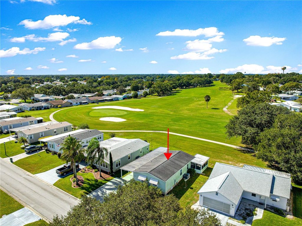 Photo of 1514 E Schwartz Boulevard, Lady Lake, FL 32159 (MLS # G5103972)