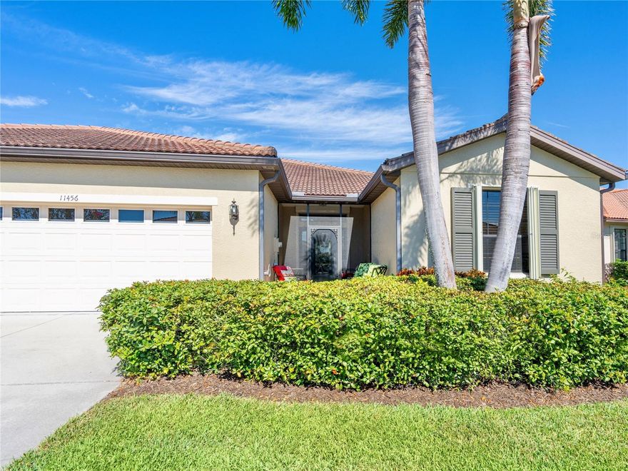 Experience maintenance-free, resort-style living in this beautiful 3-BEDROOM PLUS DEN, 2,102 sqft home in the premier 55+ community of Venetian Falls! Conveniently located just minutes from the sunny beaches, shopping, dining, and Venice's historic district, this Giovanni paired villa offers spacious rooms with CROWN MOLDING, PLANTATION SHUTTERS, CENTRAL VACUUM, and EASY-TO-USE WHOLE HOUSE STORM PROTECTION. Step through the SCREENED FRONT ENTRYWAY into a wide foyer illuminated by a BEVELED GLASS DOOR with sidelights and an overhead transom window. The kitchen features UPDATED STAINLESS-STEEL APPLIANCES, solid-wood cabinets with decorative trim, dining bar, and is open to the leisure area as well as a DINETTE surrounded by windows. The WALK-IN PANTRY provides ample storage space for staples, appliances, and platters. The PRIMARY SUITE, located at the rear of the home for added privacy, includes two closets (one a large walk-in) and a spacious bathroom with corner vanity with dual sinks, private water closet, linen closet, and a walk-in shower. At the front of the home, the guest bedrooms and bathroom create a PRIVATE RETREAT FOR VISITORS and the DEN is a versatile space for a quiet sitting area or office. Enjoy the outdoors on the lanai while you soak in the ambiance of the SERENE PRESERVE as a backdrop. This screened area is wonderful for grilling, dining, and lounging in the sun or shade. Buttoning up the property is easy convenient ACCORDION STORM SHUTTERS for the windows, plus REMOTE-CONTROLLED SHUTTER for the lanai, and ROLL-DOWN SHUTTER for the front door. A WELCOMING PAVERED PATIO as you arrive at the front entryway adds to the lovely curb appeal of this property. Venetian Falls offers exceptional community amenities, including a resort-style clubhouse with a heated lap pool and spa, resistance-walking pool, state-of-the-art fitness center, billiards room, bocce courts, full-time activity director, and on-site management. The reasonable HOA fee includes lawn maintenance, irrigation, roof pressure washing, exterior paint, basic cable, and internet, with no CDD fee. Don’t miss the chance to make this remarkable home your own!