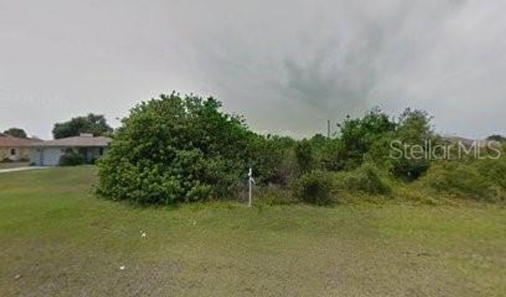 Photo of 10443 Willmington Boulevard, Englewood, FL 34224 (MLS # C7524763)