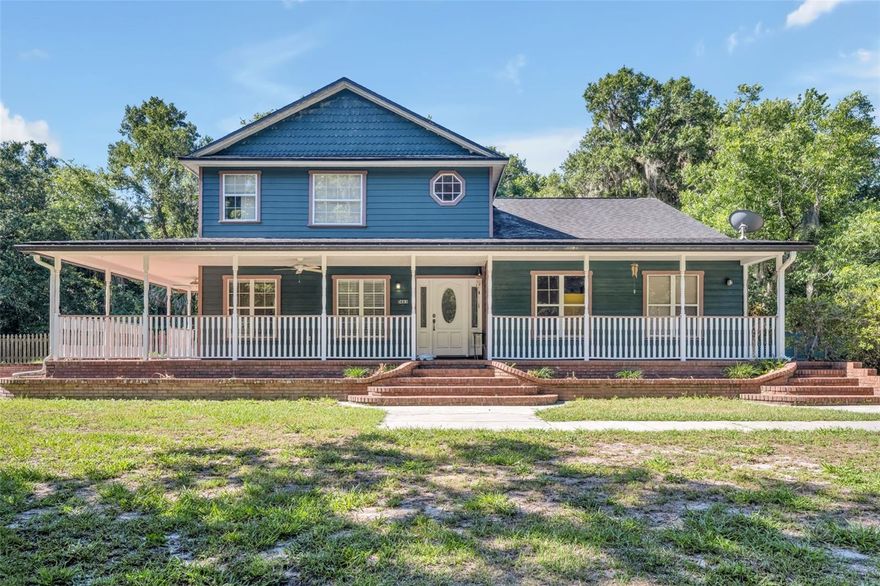 Situated on approximately 2.5 mostly cleared acres in the Black Hammock area of Oviedo, this well-maintained property offers a unique blend of privacy, outdoor amenities, and functional living space. The grounds feature a stocked fishing pond with canoe included, a small creek along the rear property line, mature fruit trees including banana, grapefruit, lemon, lime, and pineapple, as well as multiple fenced areas suitable for pets or livestock. Additional outdoor features include a tree fort overlooking the pond, swing set, chicken coop, oversized rear porch with low-maintenance artificial turf, and an 11’ x 15’ storage shed. A John Deere riding mower is also included with the sale.

The 4-bedroom, 2 1/2-bath home offers approximately 2,629 square feet of living space with thoughtful updates throughout. Interior features include laminate flooring, new downstairs carpet, fresh interior paint, granite countertops in the kitchen and bathrooms, stainless steel appliances including a double oven, reverse osmosis water filtration faucet in the kitchen, and a spacious mudroom with washer and dryer set on pedestals. A wood-burning fireplace and whole-home generator provide additional comfort and functionality.

Upstairs includes three spacious bedrooms, a loft area, and a secondary bathroom with dual sinks. Major system updates completed in 2016 include roof, HVAC, septic system, drain field, full replumb, and interior remodel. And most recently, a 2024 water heater, refrigerator, washer plus dryer with pedestals, and septic pumped just this year.

This property offers a rare opportunity for those seeking acreage, outdoor versatility, and updated living space in a convenient Oviedo location.