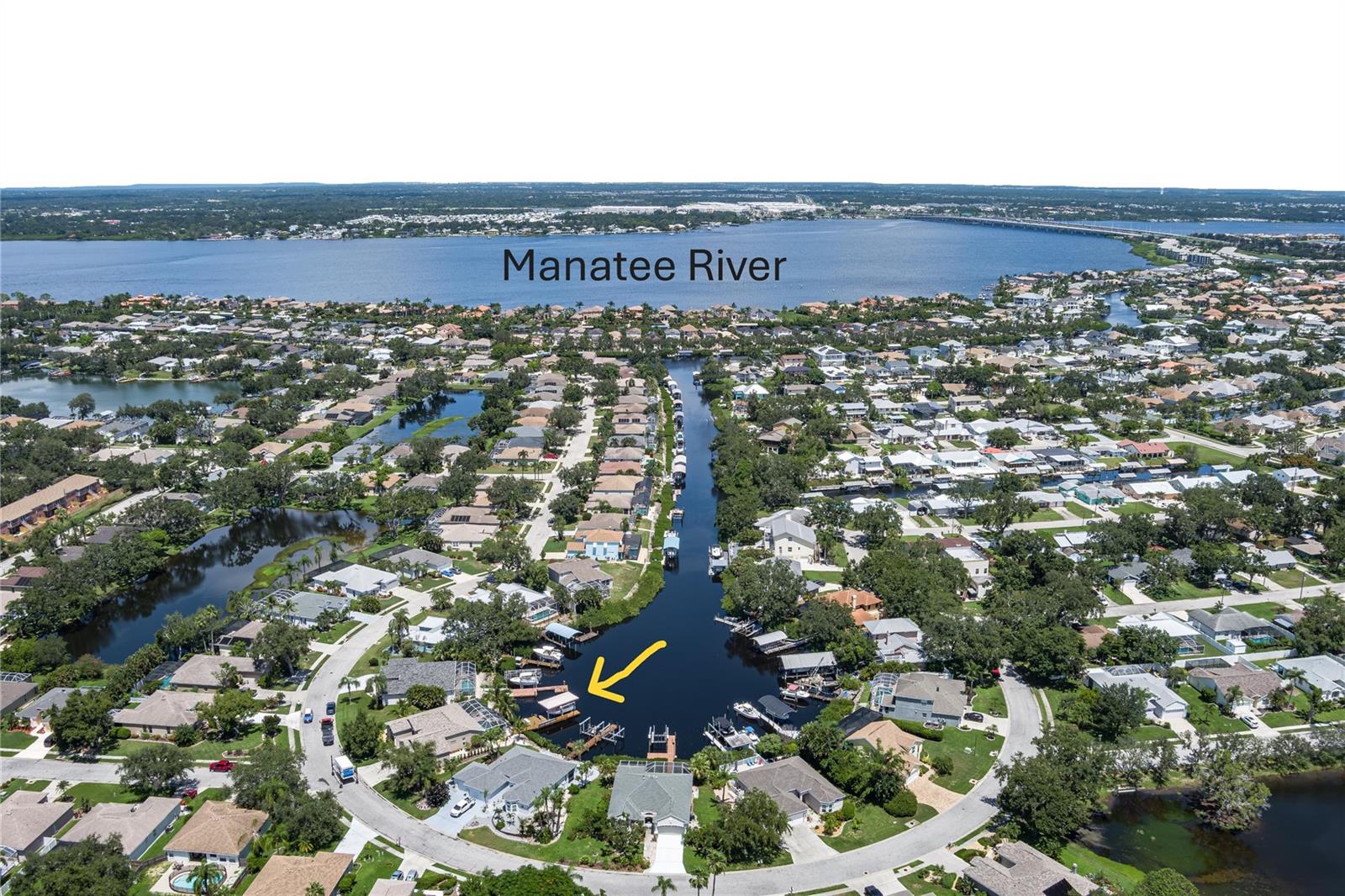 Waterfront Paradise with Direct Gulf Access. Welcome to your dream home in the sought-after River Pointe community, where boating, entertaining, and luxury living come together. The original owner's pride of ownership prevails in this beautifully updated 3-bedroom, 2-bath residence. The home sits on a wide saltwater canal at the end of a tranquil basin—offering privacy, minimal boat traffic, stunning views of dolphins dancing, manatees floating, mullet jumping, AND easy navigation to the open waters of the Manatee River, Intercoastal Waterway, and Gulf. The property is a Boater’s Dream, complete with dock, a covered lift that accommodates boats up to 28 ft and 9,000-pounds, and a floating dock. Features include a well-built and modern home; spacious 3-car garage for vehicles, gear, and storage; high ceilings, split floor plan, new roof (2020) for peace of mind, remodeled kitchen in 2021 with wood cabinetry, quartz countertops, and new appliances. Updated bathrooms (2021 & 2025) with modern finishes, new windows installed in 2022 and 2025 for energy efficiency and natural light and window hurricane screens. YOUR Outdoor Oasis offers an inground pool with waterfall and 8 spa jets, screened lanai for year-round enjoyment, an expansive paver deck and covered entertaining area—perfect for gatherings, grilling, or relaxing poolside while enjoying the serene canal views to create a true Florida escape. River Pointe residents enjoy low HOA fees and access to a private community boat ramp. This home is the ideal blend of luxury, functionality, and waterfront lifestyle. This property is located about two miles West of I-75 via SR 64, close to Costco, Publix, Target and Walmart, entertainment downtown Bradenton, River Walk, and many fine eateries. Whether you're an avid boater, entertainer, or simply seeking a peaceful retreat with upscale finishes, this home checks every box. Schedule your private showing today and experience the best of Florida living.
