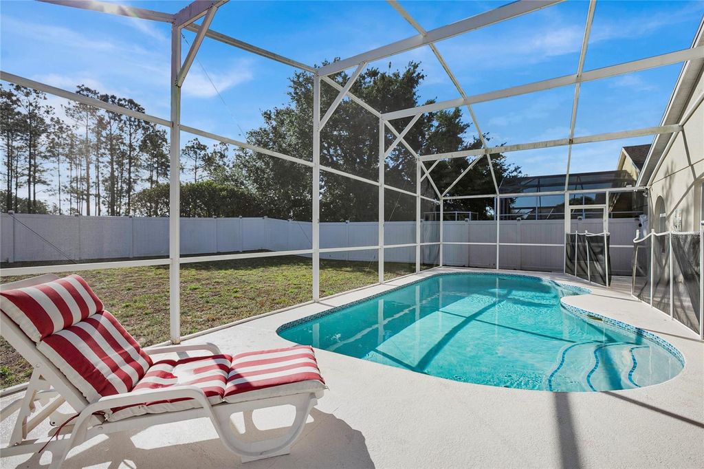 Photo of 928 Troon Circle, Davenport, FL 33897 (MLS # O6391259)