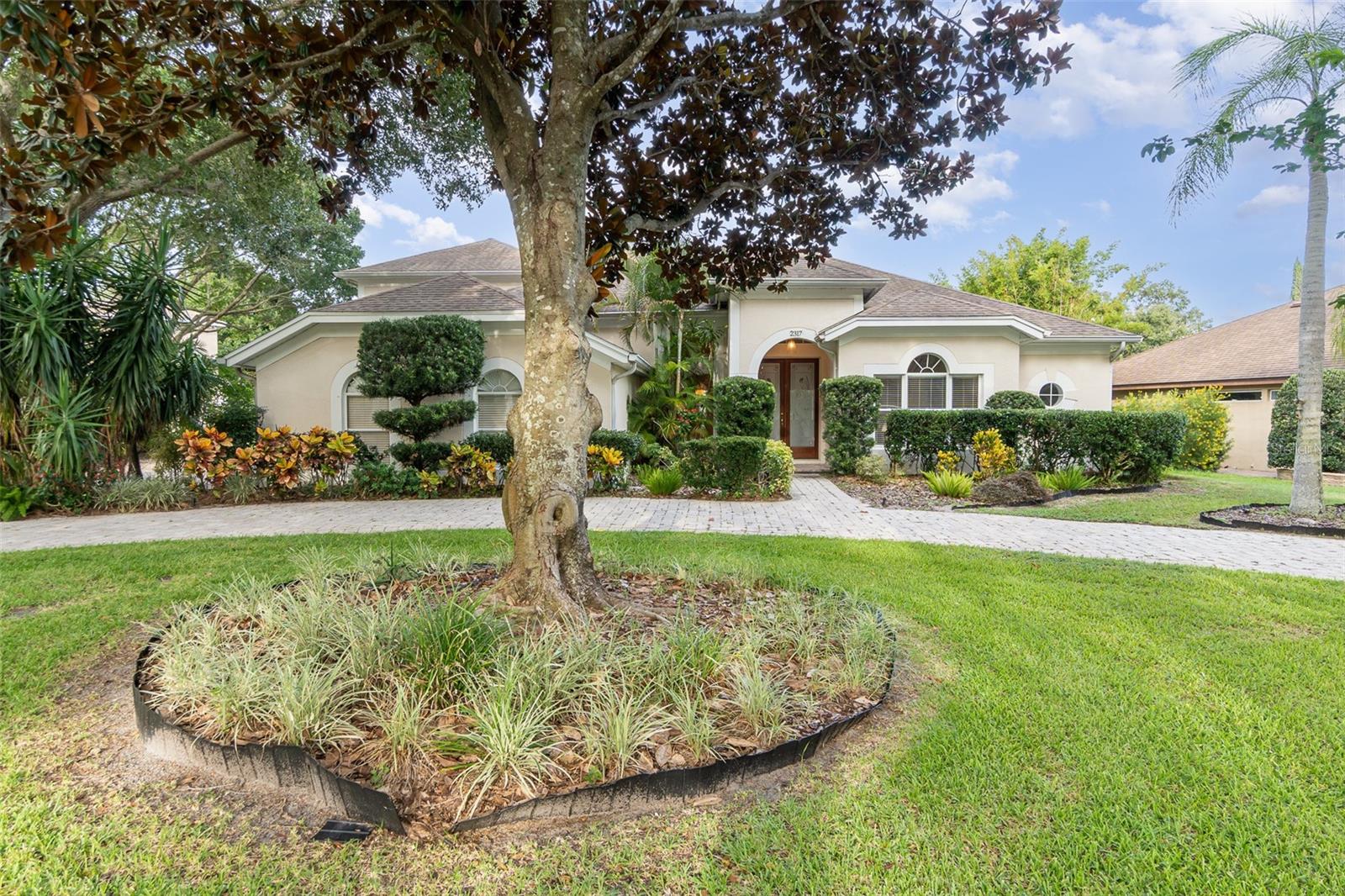 Elegant 5-Bedroom Executive Pool Home in Gated Westminster Landing
Welcome to this beautifully appointed 5-bedroom, 4-bath executive residence, ideally situated
within the prestigious gated community of Westminster Landing. Offering an exceptional blend
of comfort, privacy, and convenience, this solar-powered home features a screened pool and spa,
tranquil pond views, and no rear neighbors—creating a private oasis perfect for both everyday
living and sophisticated entertaining. Step inside to a bright, open-concept great room where natural light pours through expansive double sliding glass doors, seamlessly connecting indoor and outdoor living. The spacious screened lanai and sparkling pool with spa provide the perfect backdrop for warm Florida days and unforgettable summer gatherings. The chef’s kitchen is a dream, complete with ample counter space and cabinetry, ideal for both casual meals and formal entertaining. The first-floor primary suite is a serene retreat, offering direct pool access, a luxurious en-suite bath with dual vanities, a garden tub, walk-in shower, and an expansive walk-in closet. Three additional well-sized bedrooms are located on the main level, while the second floor features a versatile bonus room, an additional bedroom, and a cozy living area—perfect for guests, a media space, or a private home office. This property also includes a generous 3-car garage and sits on one of the most desirable lots in the neighborhood, boasting peaceful pond views. Residents of Westminster Landing enjoy exclusive access to tennis courts, a playground, open green spaces, and a private gated path to top-rated Windy Ridge K-8 school—just a short walk away. All this in a community known for its manicured surroundings and unbeatable location.
Don’t miss this rare opportunity to own a refined and energy-efficient home in one of Orlando’s most sought-after neighborhoods. Schedule your private showing today!