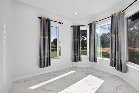 Tiny photo for 588 Dowling Circle, Lady Lake, FL 32159 (MLS # TB8455649)