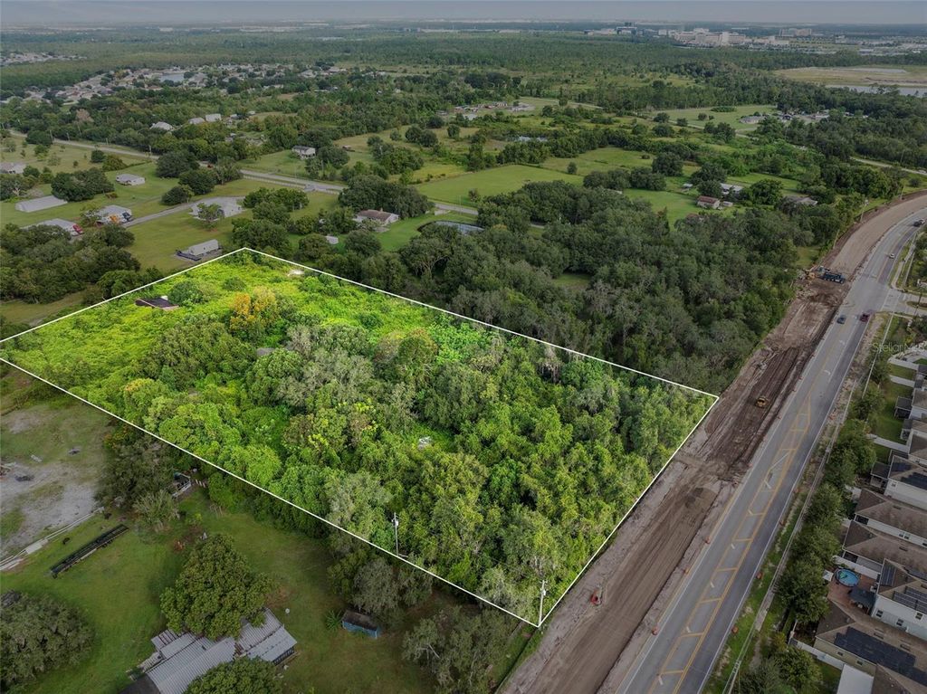 Photo of 4345 Boggy Creek Road, Kissimmee, FL 34744 (MLS # O6345938)