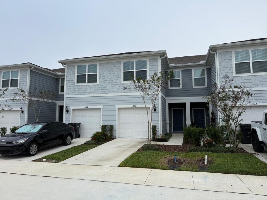 Welcome to this beautiful rental home located in the highly desirable Belle Haven community in Davenport! This modern and spacious residence features a bright open-concept floor plan with high ceilings, abundant natural light, and stylish finishes throughout. The contemporary kitchen offers stainless steel appliances, quartz countertops and ample cabinet space, making it perfect for both everyday meals and entertaining.

The bedrooms are generously sized, offering comfort and flexibility, while the bathrooms feature sleek, modern fixtures. A back patio provides the ideal spot to unwind and enjoy Florida living. A dedicated laundry area adds convenience to your daily routine.

Belle Haven is a newly developed community with resort-style amenities, including a community pool, playground, and walking trails, all designed to complement an active and relaxing lifestyle.

Located just minutes from ChampionsGate, Posner Park, restaurants, shopping, golf courses, major highways, and world-famous theme parks, this home offers unmatched convenience and accessibility.

Don’t miss this opportunity to live in one of Davenport’s most sought-after communities!
Equal Housing Opportunity.