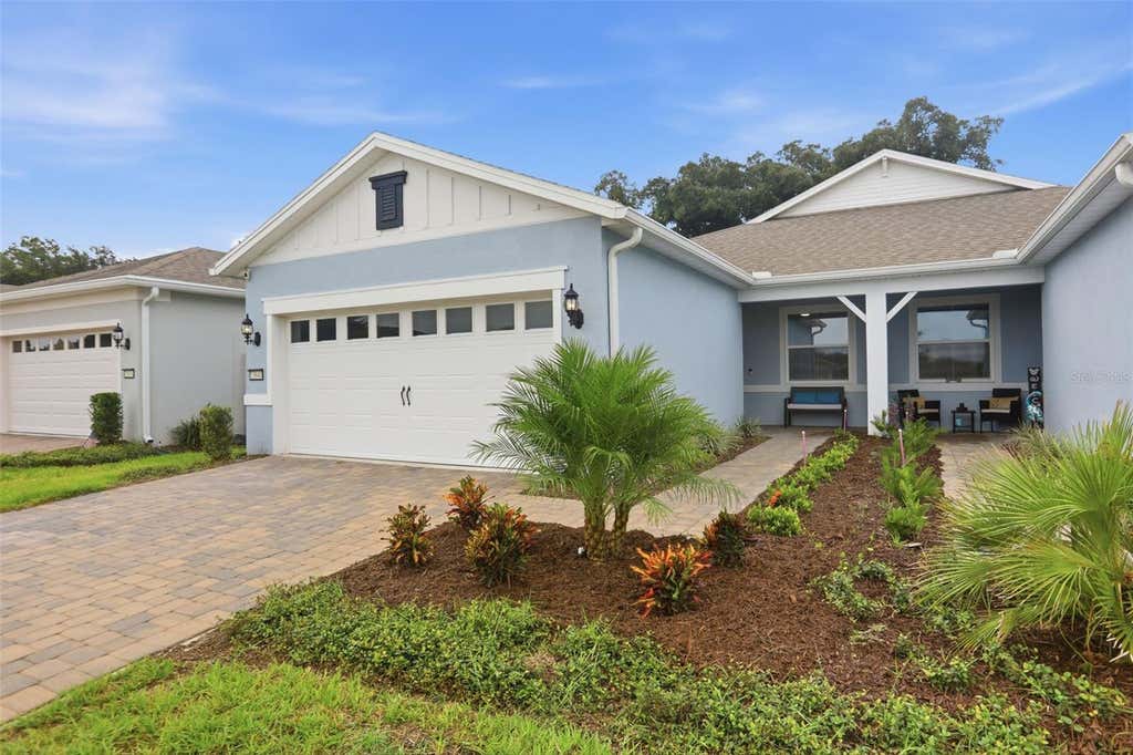 Photo of 13640 Splashing Isla Drive, Winter Garden, FL 34787 (MLS # O6427250)