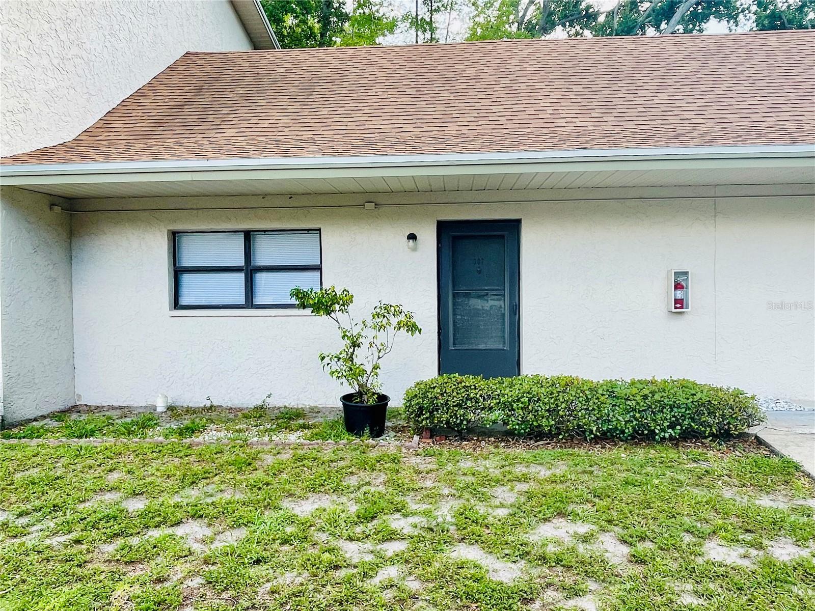Location Location ! This Attractively unique and spacious 2 bedroom 1 bath loft condominium with vaulted ceilings and pond views is located in the lovely Bradford Acres Condominium community. CASH OR NON-QM FUNDING ONLY. Perfect for investors or for a 1st time homebuyer. This is a rare floor plan in this community. In entering the unit, you’re welcomed into the living space with genuine Teak parquet flooring, vaulted ceilings, kitchen area with a beautiful bay window with views of the community pond, bathroom, and downstairs bedroom. The spiral staircase leads to the 2nd floor loft area which can serve as 2nd bedroom or as the master bedroom or as an additional living space, office, gym, craft or bonus room. The loft windows have beautiful view of the pond area. Perfect for an individual, couple, or small family. Ample closet space in living area, bedroom and upstairs loft area. There are two wall units; they are located in the kitchen & bedroom. Freshly painted, new laminate flooring in bedroom and new blinds ! Move in ready! Conveniently located for easy quick commute to Tampa or St. Pete.! Everything is close by Airports, Restaurants, Theaters. Museums, Libraries and those famous Pinellas County Beaches! Come see this unique condominium today!! Room sizes are approximate. Buyers to verify all information pertinent to their purchase decision. Sold as is
