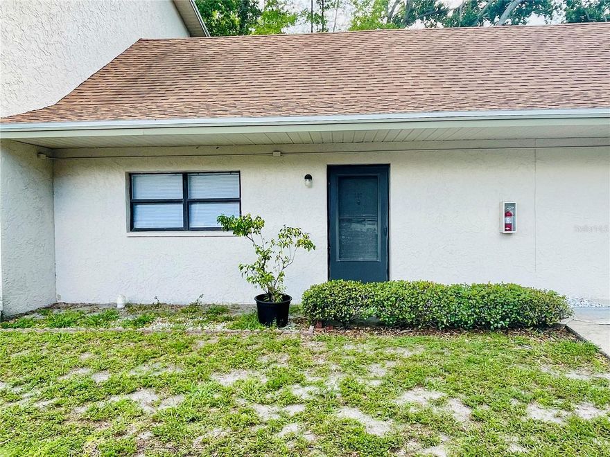 Location Location ! This Attractively unique and spacious 2 bedroom 1 bath loft condominium with vaulted ceilings and pond views is located in the lovely Bradford Acres Condominium community. CASH OR NON-QM FUNDING ONLY. Perfect for investors or for a 1st time homebuyer. This is a rare floor plan in this community. In entering the unit, you’re welcomed into the living space with genuine Teak parquet flooring, vaulted ceilings, kitchen area with a beautiful bay window with views of the community pond, bathroom, and downstairs bedroom. The spiral staircase leads to the 2nd floor loft area which can serve as 2nd bedroom or as the master bedroom or as an additional living space, office, gym, craft or bonus room. The loft windows have beautiful view of the pond area. Perfect for an individual, couple, or small family. Ample closet space in living area, bedroom and upstairs loft area. There are two wall units; they are located in the kitchen & bedroom. Freshly painted, new laminate flooring in bedroom and new blinds ! Move in ready! Conveniently located for easy quick commute to Tampa or St. Pete.! Everything is close by Airports, Restaurants, Theaters. Museums, Libraries and those famous Pinellas County Beaches!  Come see this unique condominium today!! Room sizes are approximate. Buyers to verify all information pertinent to their purchase decision. Sold as is