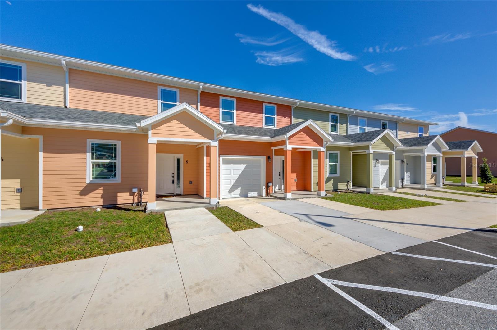 Introducing NEW CONSTRUCTION at Eagle Trace, just 2.3 miles from the University of Florida in the heart of NW Gainesville. The Model B, has a covered entry and offers a spacious two-story design with 3 bedrooms, 3.5 bathrooms. The main level includes a master bedroom with a private bath, along with a convenient half-bath for guests. Upstairs, two additional bedrooms each have their own bathrooms. Gourmet kitchen with quartz counters, custom soft-close cabinetry, and fully equipped with stainless steel appliances—including refrigerator, smooth-top range, microwave, dishwasher, and garbage disposal. Double-pane windows, luxury vinyl tile wood-look flooring, and porcelain tile paired with quartz countertops in the bathrooms, and window blinds included too! Eagle Trace has a beautiful lake-view entrance, a pool, clubhouse, and fitness center—all with a low HOA fee. Each condo comes with a 1-year builder warranty. Please note that the photos are of a recently completed model unit with comparable finishes, but may not reflect the specific floor plan of this unit. With quick access to UF Health Shands Hospital, UF campus, and Downtown Gainesville, this new construction condo offers the perfect blend of luxury, affordability, and convenience!